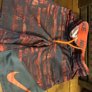 Boys orange and grey Nike shorts